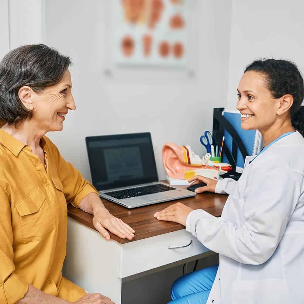 Patient And Audiologist Talking