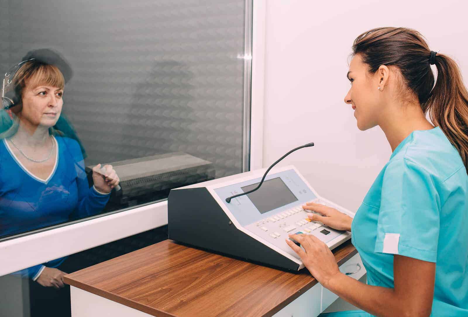Patient And Audiologist Talking